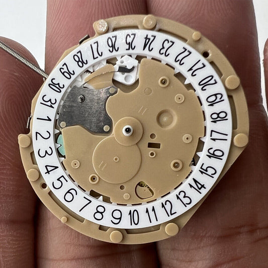 Sunon PE60 quartz watch movement with 3 hands and date at 6 o'clock, precise timekeeping.