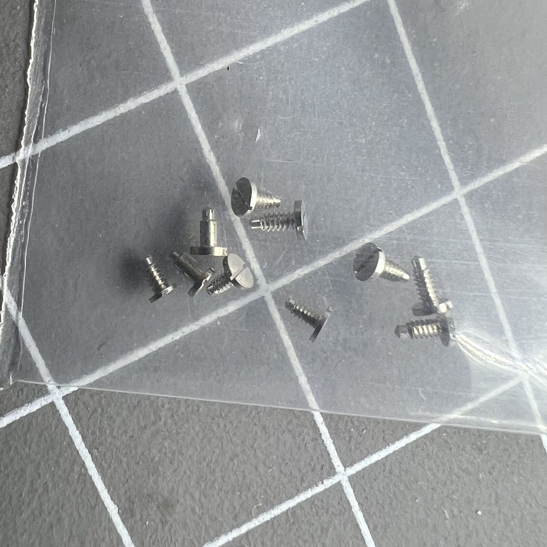 Close-up of Generic brand screws for Wheel Bridge Splint, compatible with China Made 7120 watch movement.