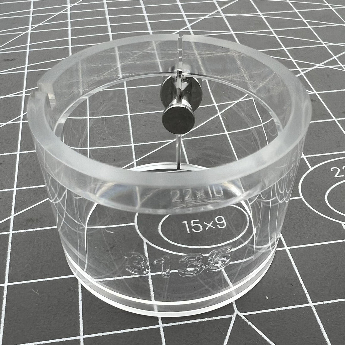 Clear RLX3135 watch movement holder showcasing internal components for precise repair work.