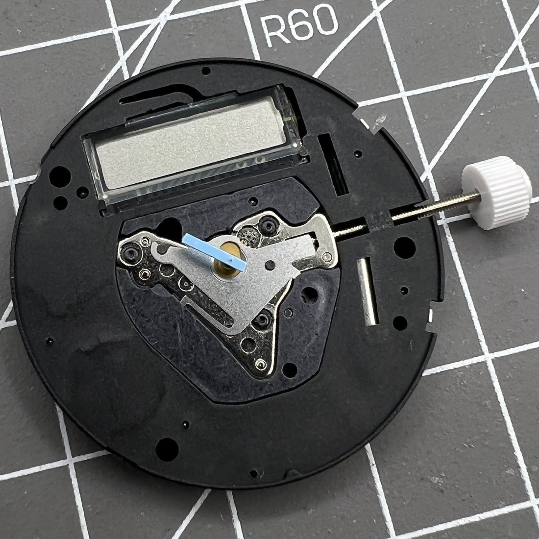ISA K63 Swiss quartz watch movement with 3 hands display and dual battery power for precise timekeeping.