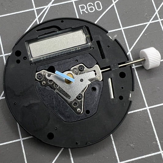 ISA K63 Swiss quartz watch movement with 3 hands display and dual battery power for precise timekeeping.
