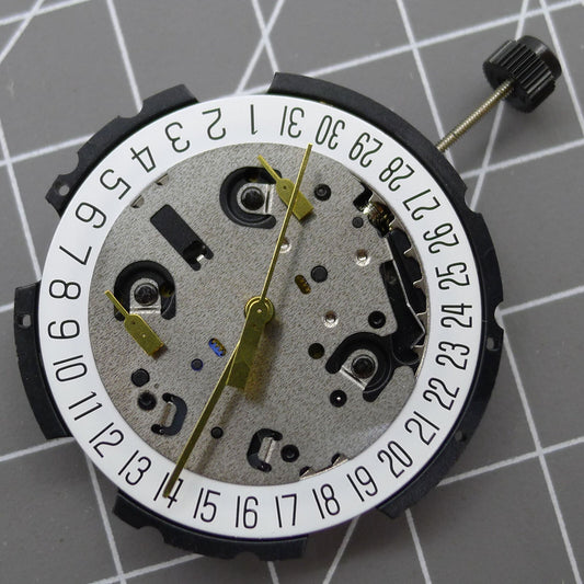Swiss ETA G10.212 quartz watch movement with 3 hands and date at 6, Swiss made precision.