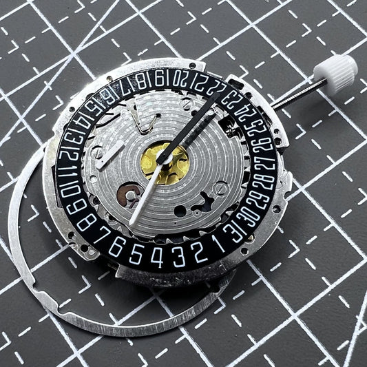 Black dial ISA 8171A quartz watch with 4 hands, date at 6 o'clock, Swiss brand detail