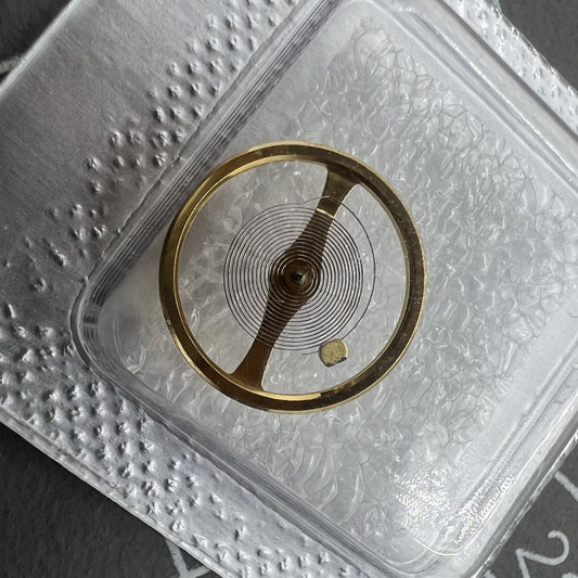 Golden complete balance wheel with hairspring for NH35/NH36/NH38/NH39 movements by Seiko, precise watch part.