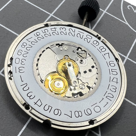 ETA 555.415 quartz watch movement with 3 hands and date at 3, original old stock component.