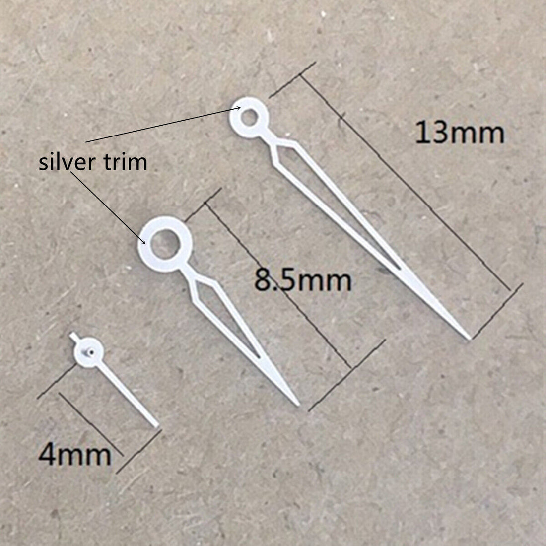 Silver trim hollow arrow watch hands for Miyota 1L45 quartz movement, stylish and precise timekeeping.