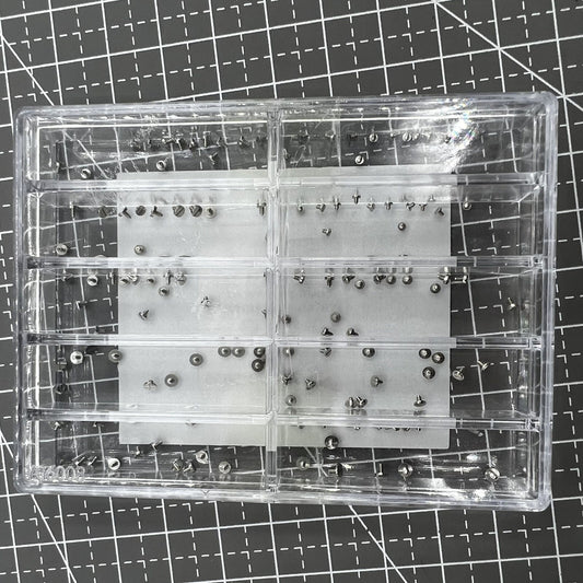 Assortment of fixing screws for watch movements in multiple sizes