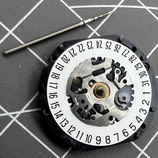 Hattori Epson TMI VX12 quartz watch movement with date at 3/6, Japan made precision parts