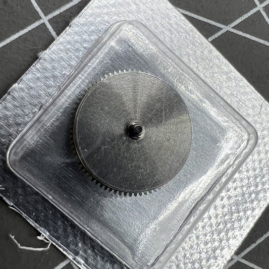 Silver barrel mainspring for Miyota 8200 8215 watch movement, compatible generic replacement part.