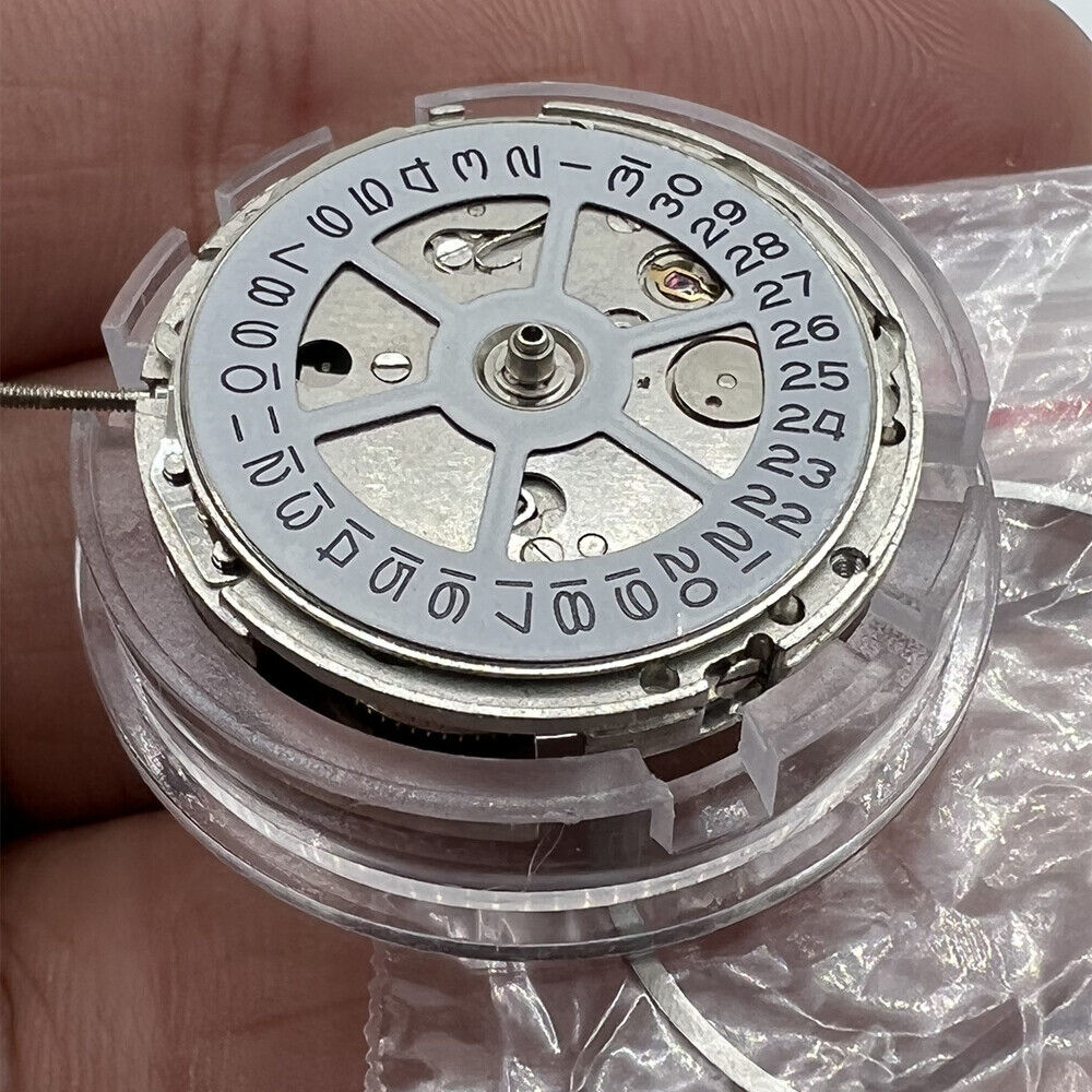 MINGZHU 2813 automatic mechanical watch with wide brim and date display at 3 o'clock.