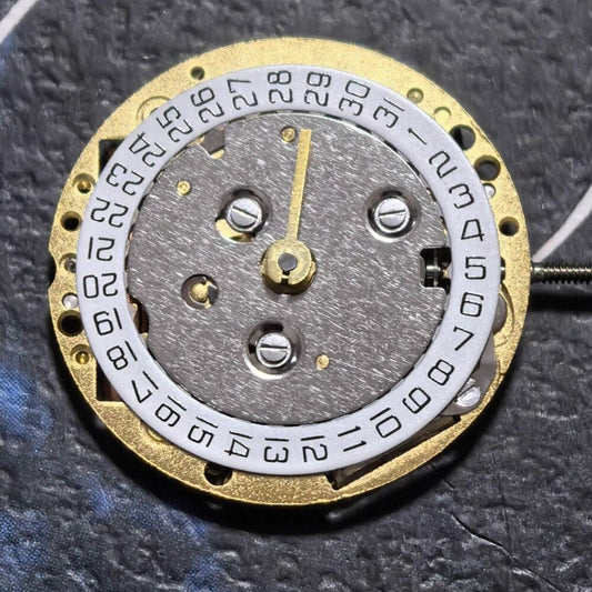 Swiss Made ISA222 watch movement with 2 hands and date display at 3 o'clock, precision quartz mechanism.