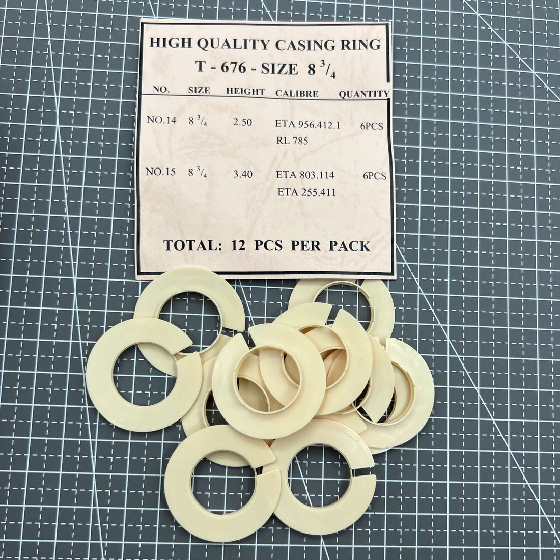 Set of 12 T-676 watch movement casing rings, size 8.75, for precise spacer alignment.