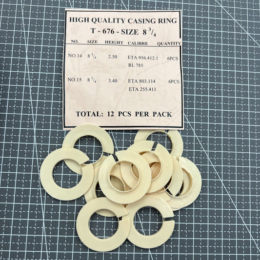 Set of 12 T-676 watch movement casing rings, size 8.75, for precise spacer alignment.
