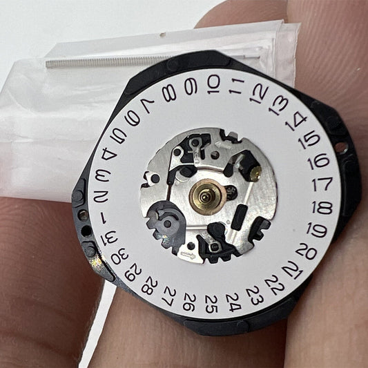 Hattori Epson VX32E quartz watch movement with date display at 3 o'clock, Japan-made precision.