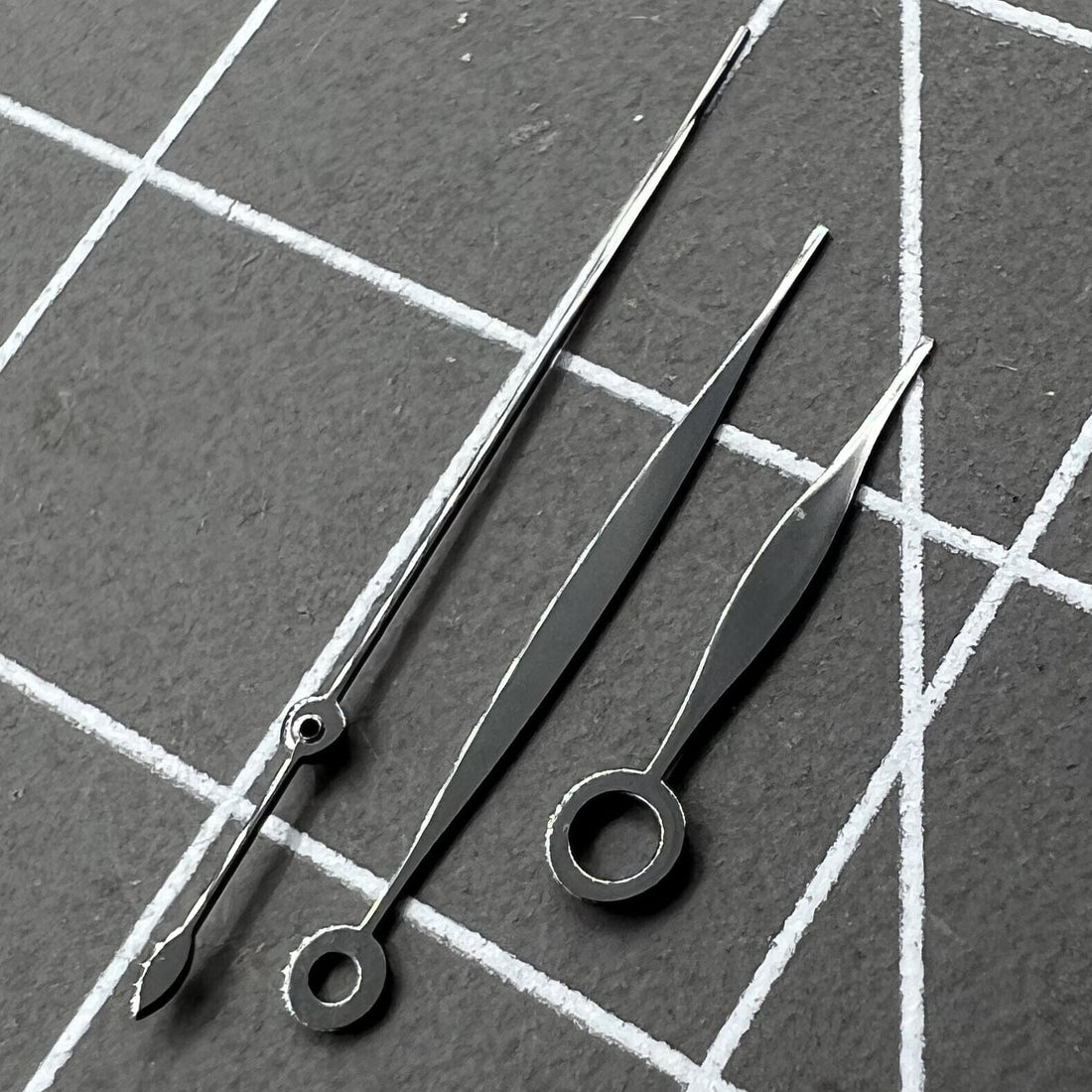 Black polished watch hands set 10.5x16x16mm for Tissot 1853 T41 T006 movement, precise fit and style.