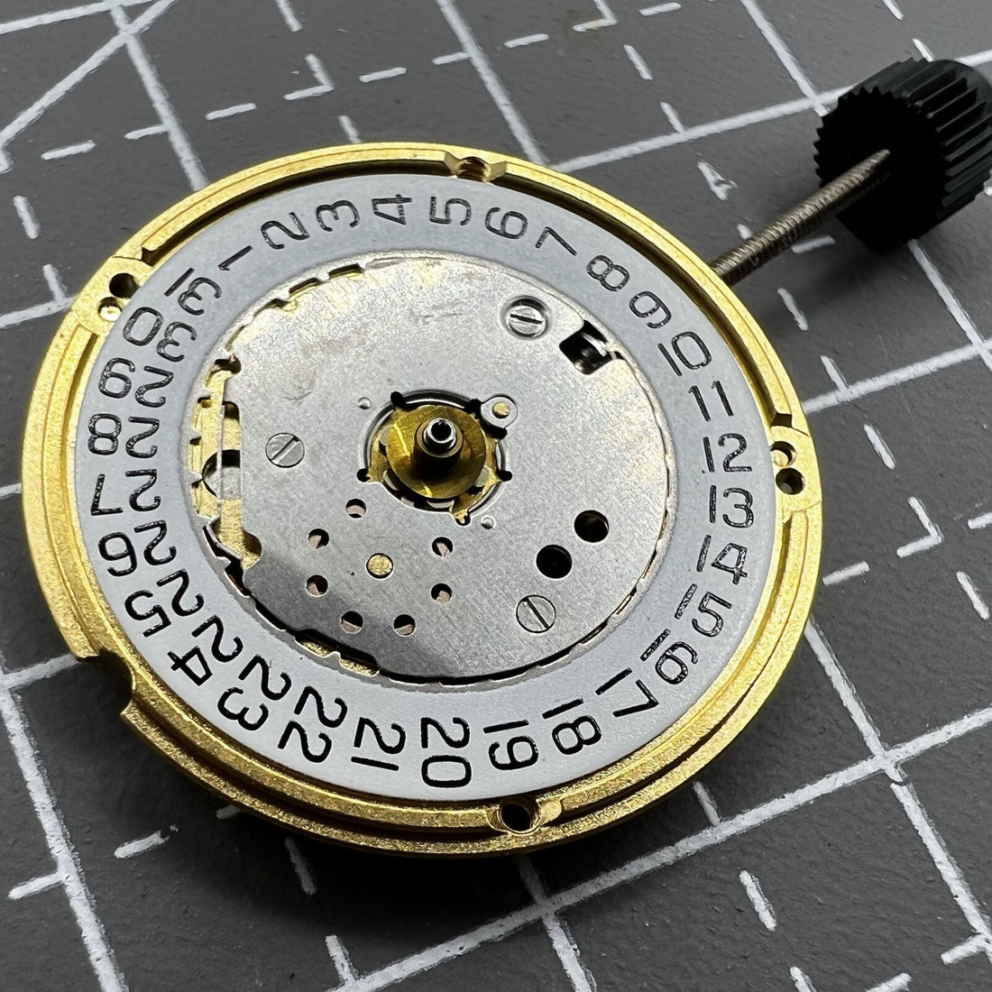 ETA F04.111 Swiss quartz watch movement with 3 hands and date function for precise timekeeping.