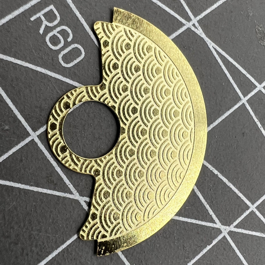 Golden waved metal sheet overlay rotor hammer designed for Miyota 9015 movement, enhancing watch performance.