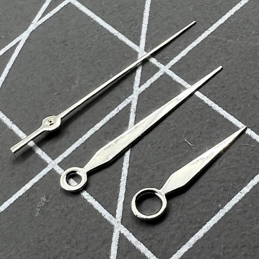 13mm silver watch hands set for NH35/NH36/4R/7S movement, sleek and precise replacement.