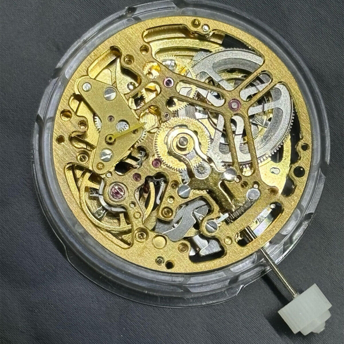 Hangzhou 75DOA hollow golden watch movement with 2 hands and small seconds at 7, auto mechanical mechanism.