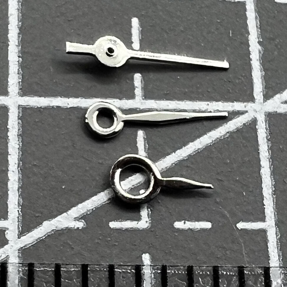 Silver set of watch hands for Miyota 2035 movement, sizes 7mm, 6mm, and 4mm, durable precision parts.