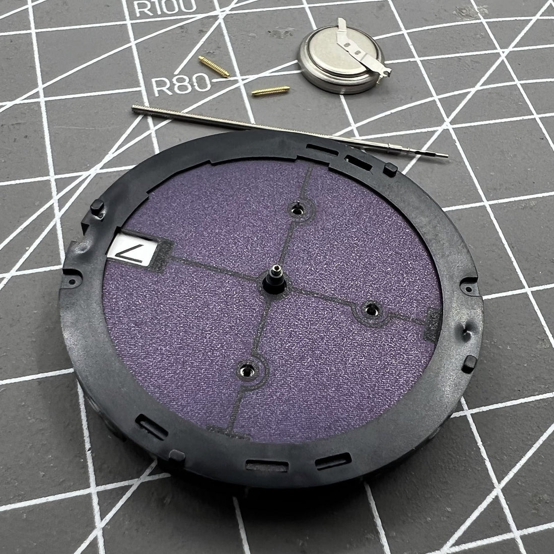 Hattori Epson TMI VR43 quartz watch movement for precise timekeeping in watch repairs.