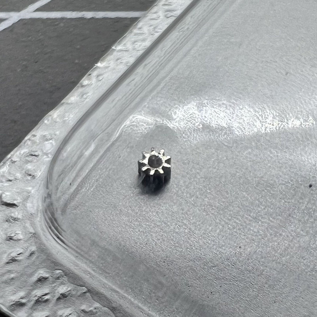 Setting wheel for ETA 2671 watch movement, precision gear accessory for repair and maintenance.
