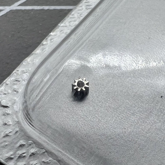 Setting wheel for ETA 2671 watch movement, precision gear accessory for repair and maintenance.