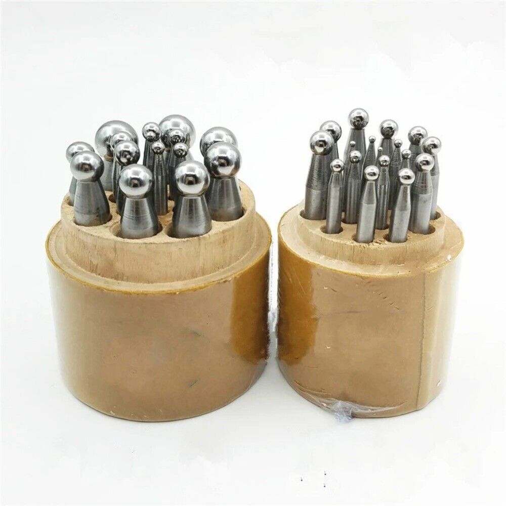 Shaping dapping punch set with wooden stand, ideal for jewelers and metalsmiths crafting detailed designs.