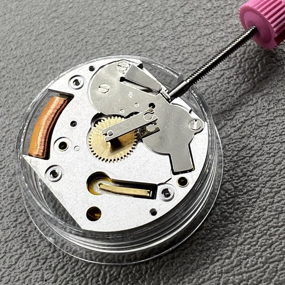 Cartier CTR-057 Swiss quartz watch movement, luxury timepiece mechanism for precision.