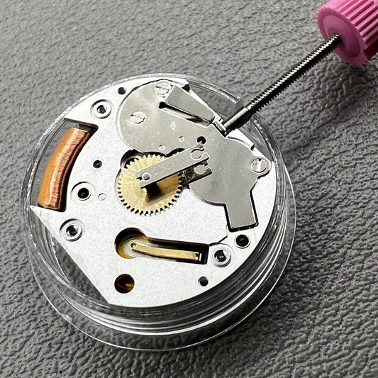 Cartier CTR-057 Swiss quartz watch movement, luxury timepiece mechanism for precision.
