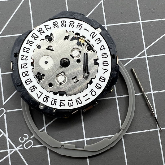 Japan Hattori Epson TMI YM91A quartz watch movement with date display at 3 o?clock, Japan made.