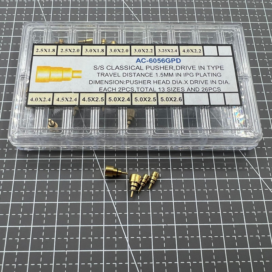 1. Golden stainless steel watch pushers in 13 sizes for precise drive-in installation.  