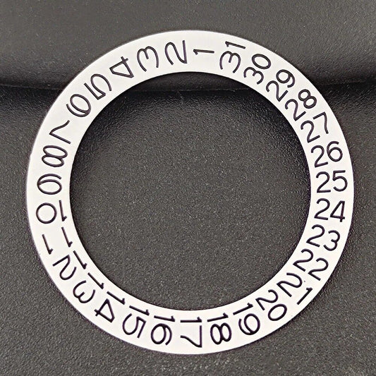 Black and grey date disk overlay for NH35/NH36 watches, enhancing dial clarity and style.