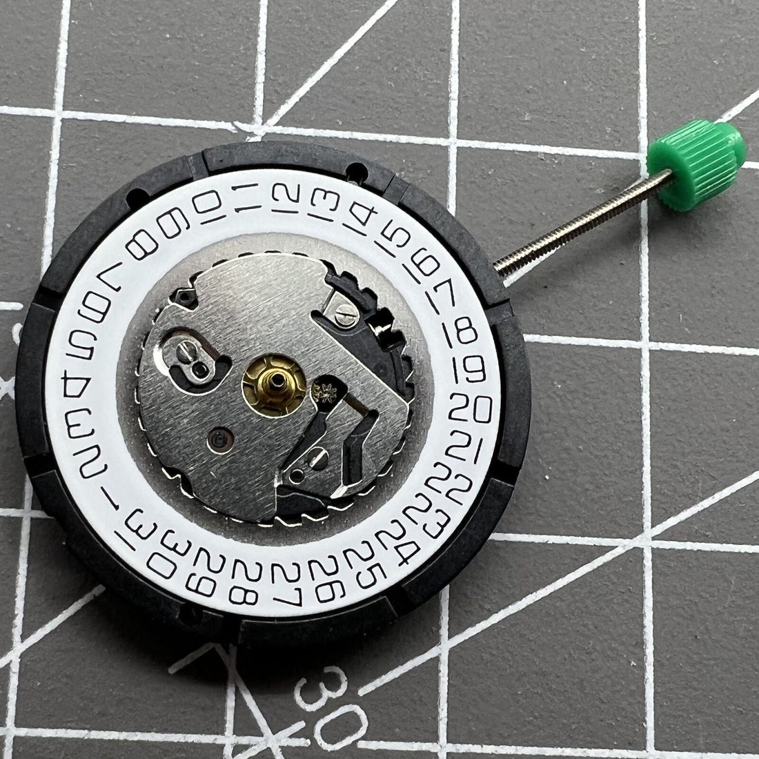 ISA 2330 watch with white dial, quartz movement, and date display at 3 o?clock.