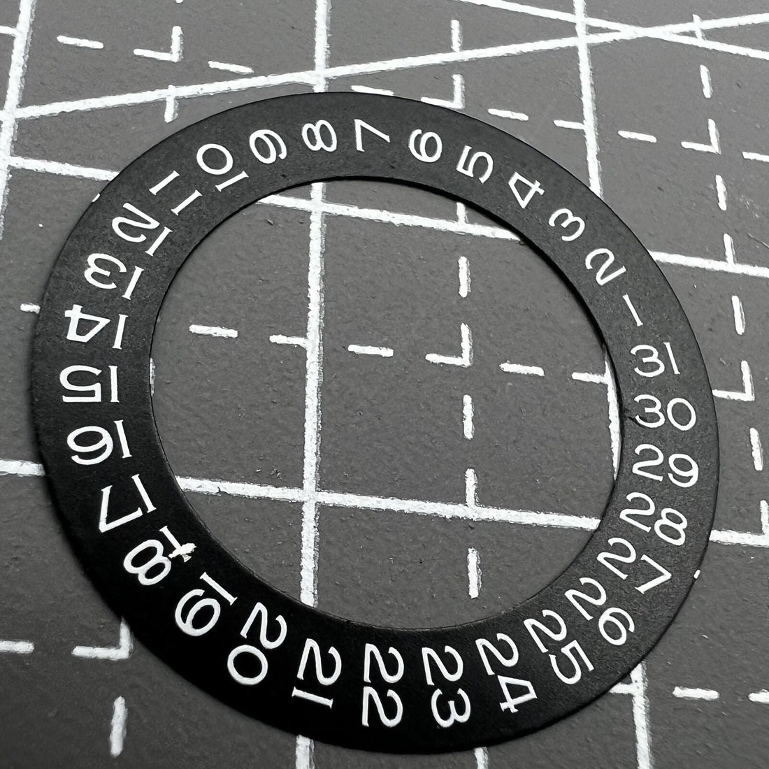 White font date wheel overlay for ETA2824 2836 Miyota 8215/8200 watch movement at 3 o'clock position.