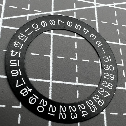 White font date wheel overlay for ETA2824 2836 Miyota 8215/8200 watch movement at 3 o'clock position.