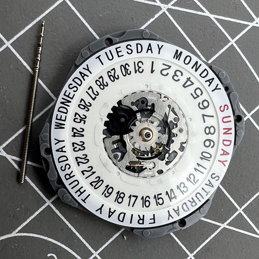 Hattori Epson VJ55B quartz watch movement with date at 6, precision Japan-made for accessories.