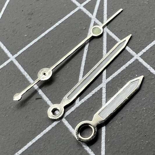Silver-trimmed 11.5mm watch hands with green lume for Ronda 515 quartz,.