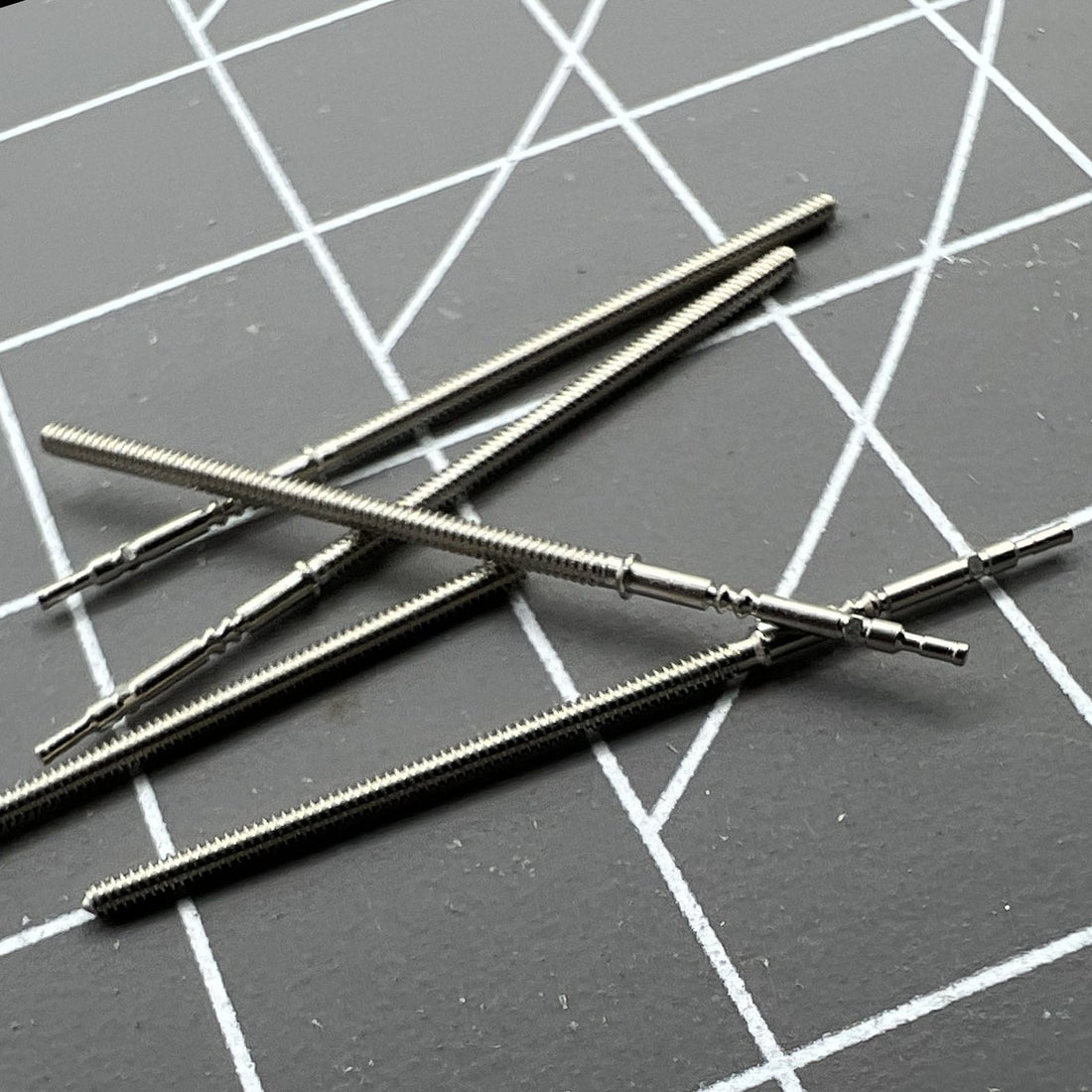 Replacement watch winding stem for PE70, PE90, PE50 movements, durable and precise fit.