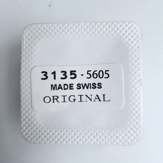 1. Close-up of Replacements 3135-5605 date indicator driving wheel screws for 3135 watch movement by Rolex.  