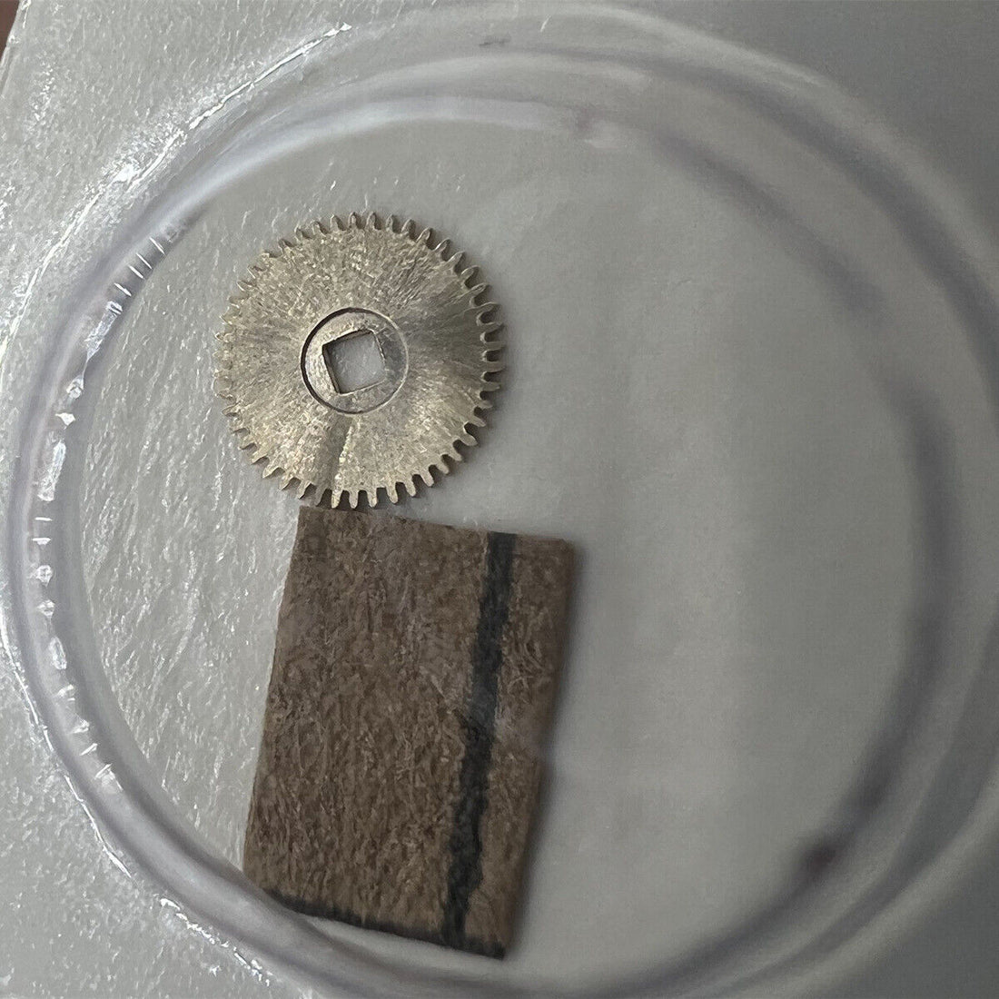Generic movement ratchet wheel for RLX 2235/2230 watch, durable replacement part for smooth gear function.