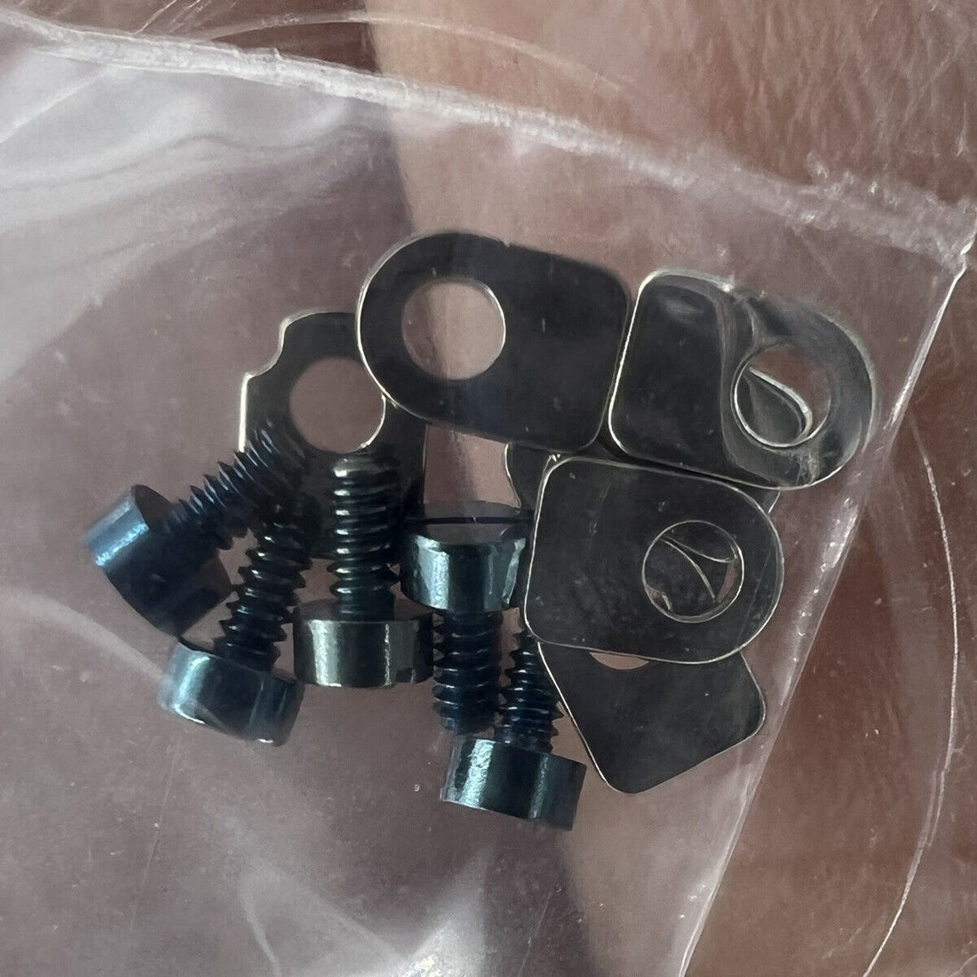 1. Assorted watch part casing clamps with screws for Seagull ST3600 and ETA6497 movements.  