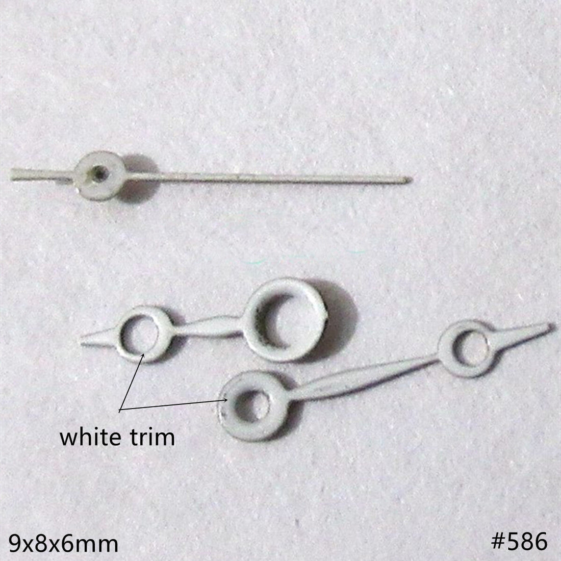 9mm white hollow watch hands set for Miyota 2035 movement, enhancing timepiece clarity and style.