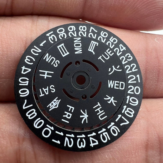 Blue and green lume black date and week wheel for NH36 watch movement, enhancing visibility and precision.