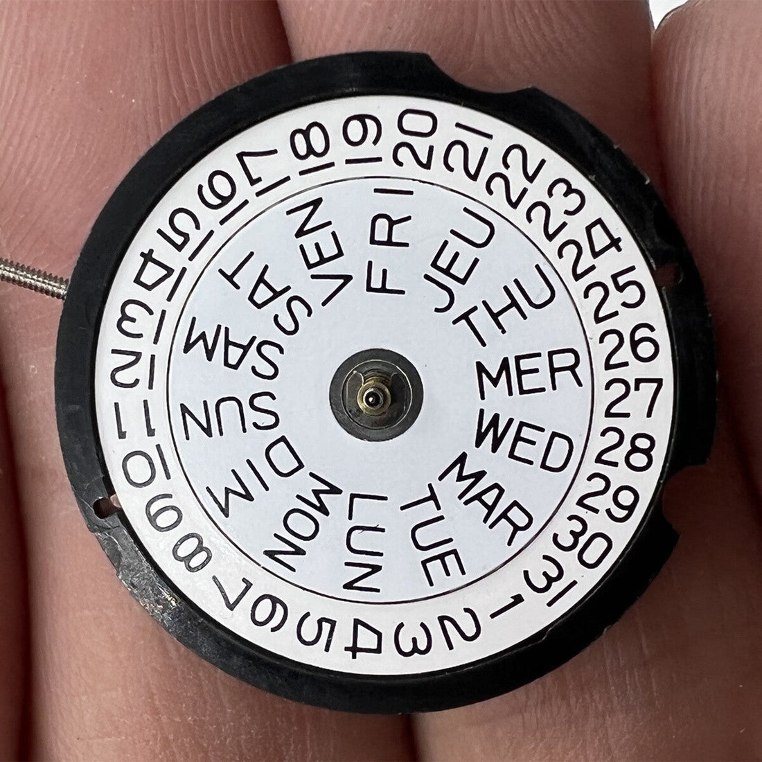 Ronda 507 Swiss quartz watch movement with English characters for precise watch repair.