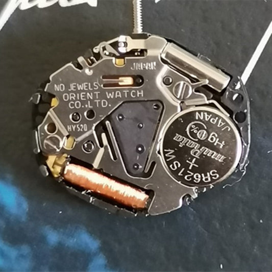 Orient HY520 quartz watch movement with 3 hands, no jewels or calendar, for precise timekeeping.