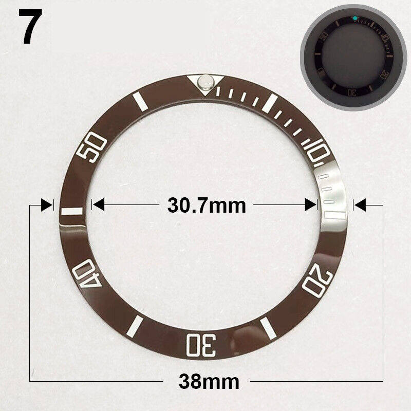 38mm Ceramic brown watch bezel with green luminous markers, silver font, for precise timekeeping.