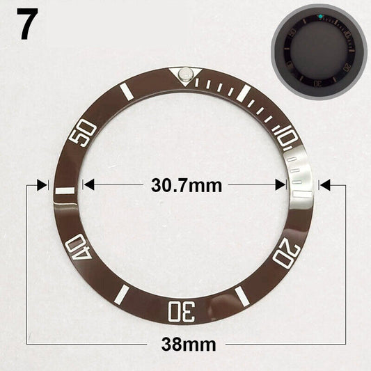 38mm Ceramic brown watch bezel with green luminous markers, silver font, for precise timekeeping.