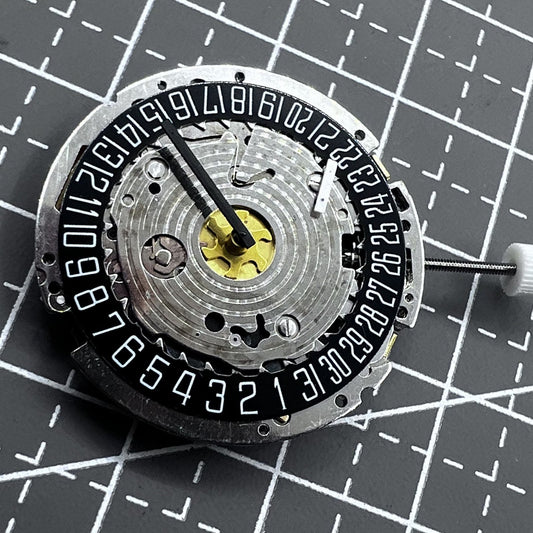 Swiss ISA 8176 /2050 quartz watch movement showing multifunctional small second at 2 o'clock for precise timekeeping.
