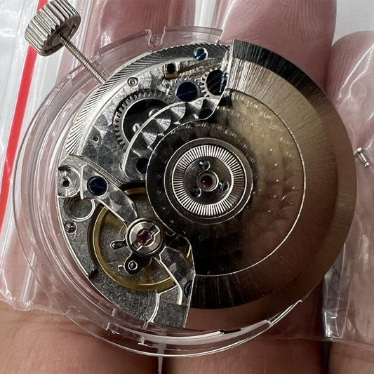 Close-up of China Made Tianjin Seagull ST25 multifunction automatic watch movement showcasing precision mechanical components.